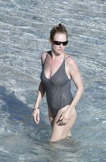 UMA THURMAN in Swimsuit at a Beach in St Barts 04/02/2018