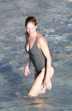 UMA THURMAN in Swimsuit at a Beach in St Barts 04/02/2018