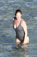 UMA THURMAN in Swimsuit at a Beach in St Barts 04/02/2018