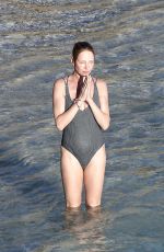 UMA THURMAN in Swimsuit at a Beach in St Barts 04/02/2018