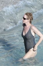 UMA THURMAN in Swimsuit at a Beach in St Barts 04/02/2018