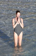 UMA THURMAN in Swimsuit at a Beach in St Barts 04/02/2018