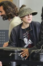 WINONA RYDER at LAX Airport in Los Angeles 04/15/2018