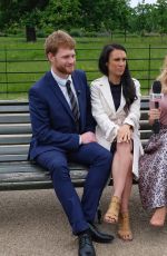 AMANDA HOLDEN Interviewing Harry and Meghan Lookalikes at Kensington Palace in London 05/16/2018