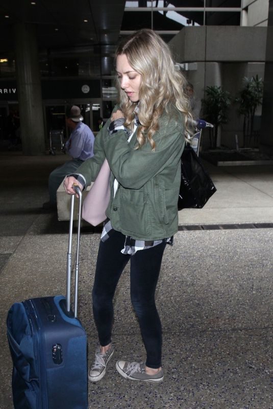 AMANDA SEYFRIED at LAX Airport in Los Angeles 05/11/2018