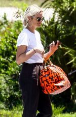 ASHLEE SIMPSON Arrives at Airport in Eleuthera 04/30/2018