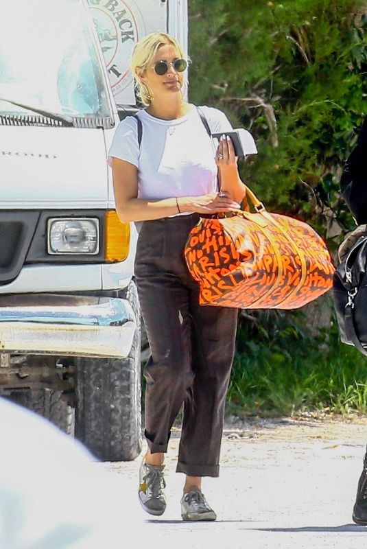 ASHLEE SIMPSON Arrives at Airport in Eleuthera 04/30/2018