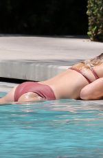 ASHLEY GREENE in Bikini at a Pool in Miami 05/10/2018