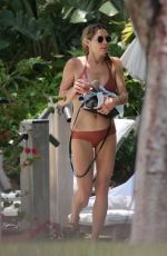 ASHLEY GREENE in Bikini at a Pool in Miami 05/10/2018