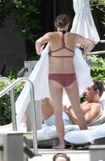 ASHLEY GREENE in Bikini at a Pool in Miami 05/10/2018