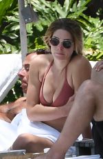 ASHLEY GREENE in Bikini at a Pool in Miami 05/10/2018