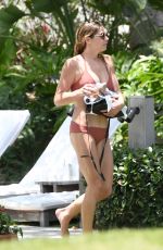 ASHLEY GREENE in Bikini at a Pool in Miami 05/10/2018