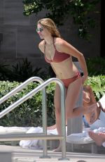 ASHLEY GREENE in Bikini at a Pool in Miami 05/10/2018