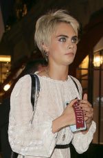 CARA DELEVINGNE Arrives at Cafe De Longchamp in Paris 05/03/2018