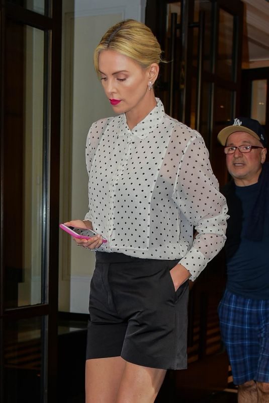 CHARLIZE THERON Leaves Her Hotel in New York 05/04/2018