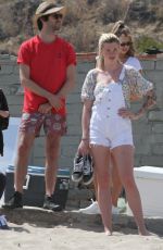 CHARLOTTE MCKINNEY and IRELAND BALDWIN Out in Malibu 05/05/2018