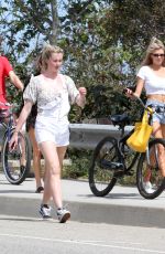 CHARLOTTE MCKINNEY and IRELAND BALDWIN Out in Malibu 05/05/2018