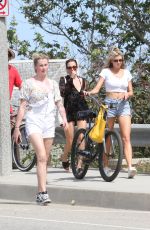 CHARLOTTE MCKINNEY and IRELAND BALDWIN Out in Malibu 05/05/2018