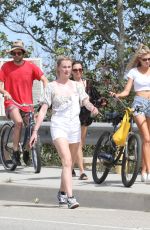 CHARLOTTE MCKINNEY and IRELAND BALDWIN Out in Malibu 05/05/2018