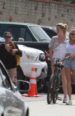 CHARLOTTE MCKINNEY and IRELAND BALDWIN Out in Malibu 05/05/2018