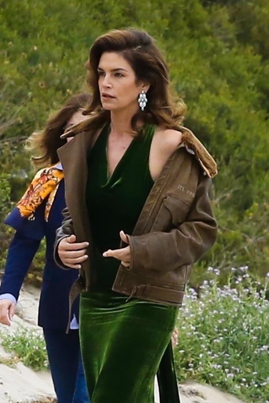 CINDY CRAWFORD on the Set of a Photoshoot at a Beach in Malibu 05/24/2018
