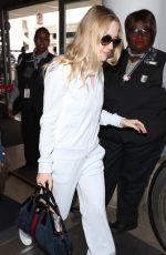 DAKOTA FANNING at Los Angeles International Airport 05/24/2018
