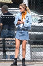 DOUTZEN KROES in Denim Skirt at a Park in New York 05/07/2018