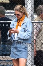 DOUTZEN KROES in Denim Skirt at a Park in New York 05/07/2018