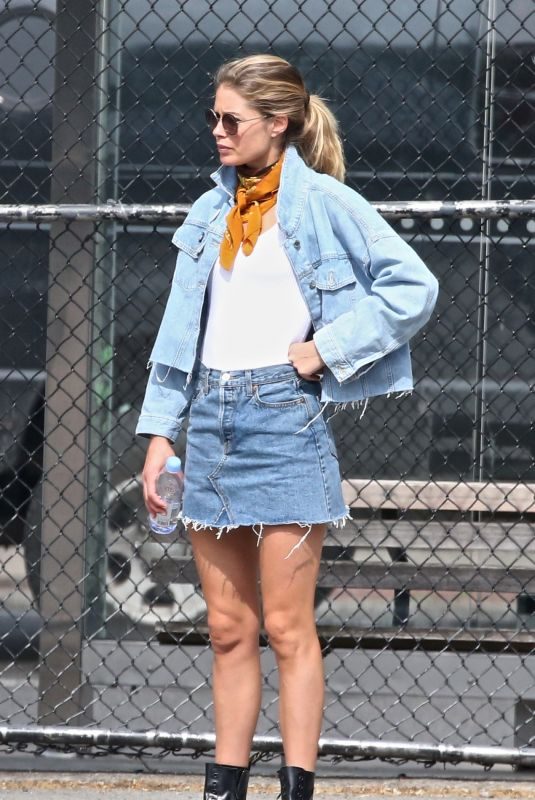 DOUTZEN KROES in Denim Skirt at a Park in New York 05/07/2018