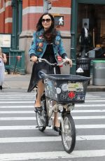 FAMKE JANSSEN Out Riding a Bike in New York 05/06/2018