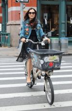 FAMKE JANSSEN Out Riding a Bike in New York 05/06/2018
