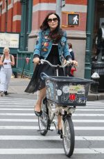FAMKE JANSSEN Out Riding a Bike in New York 05/06/2018