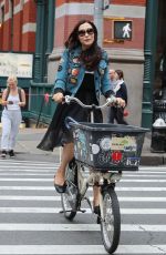 FAMKE JANSSEN Out Riding a Bike in New York 05/06/2018