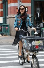 FAMKE JANSSEN Out Riding a Bike in New York 05/06/2018