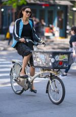 FAMKE JANSSEN Riding Bike Out in New York 05/14/2018