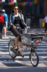 FAMKE JANSSEN Riding Bike Out in New York 05/14/2018
