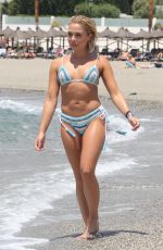 GABBY ALLEN and TYNE-LEXY CLARSON in Bikinis at a Beach in Marbella 05/28/2018