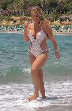 GABBY ALLEN and TYNE-LEXY CLARSON in Bikinis at a Beach in Marbella 05/28/2018