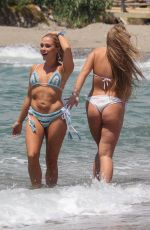 GABBY ALLEN and TYNE-LEXY CLARSON in Bikinis at a Beach in Marbella 05/28/2018