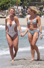 GABBY ALLEN and TYNE-LEXY CLARSON in Bikinis at a Beach in Marbella 05/28/2018