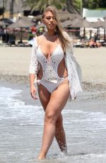 GABBY ALLEN and TYNE-LEXY CLARSON in Bikinis at a Beach in Marbella 05/28/2018