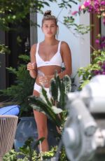 HAILEY BALDWIN in Bikini at a Pool in Miami 04/30/2018