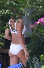 HAILEY BALDWIN in Bikini at a Pool in Miami 04/30/2018