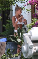 HAILEY BALDWIN in Bikini at a Pool in Miami 04/30/2018