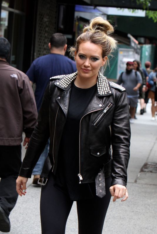 HILARY DUFF in Studded Leather Jacket on the Set of Younger in New York 05/23/2018