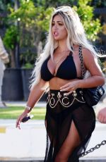 HOLLY HAGAN in Bikini Top Out in Marbella 05/28/2018