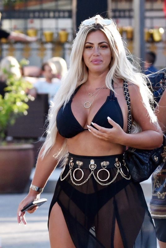 HOLLY HAGAN in Bikini Top Out in Marbella 05/28/2018