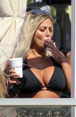 HOLLY HAGAN in Bikini Top Out in Marbella 05/28/2018