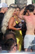 HOLLY HAGAN in Bikini Top Out in Marbella 05/28/2018