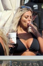 HOLLY HAGAN in Bikini Top Out in Marbella 05/28/2018